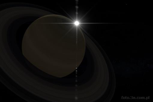 Saturn; pier¶cienie; S³oñce; b³ysk; flara; gwiazdy; planeta; kosmos